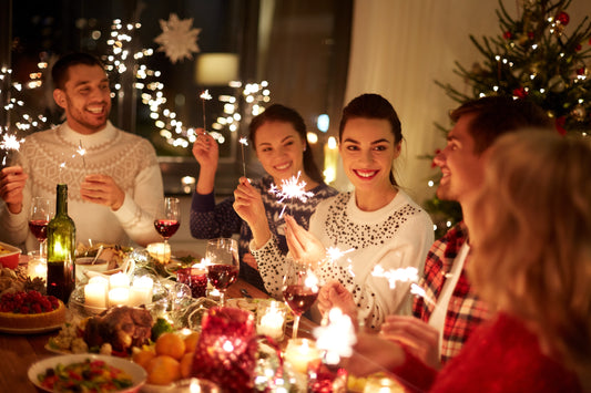 Group of friends celebrating at Christmas party 