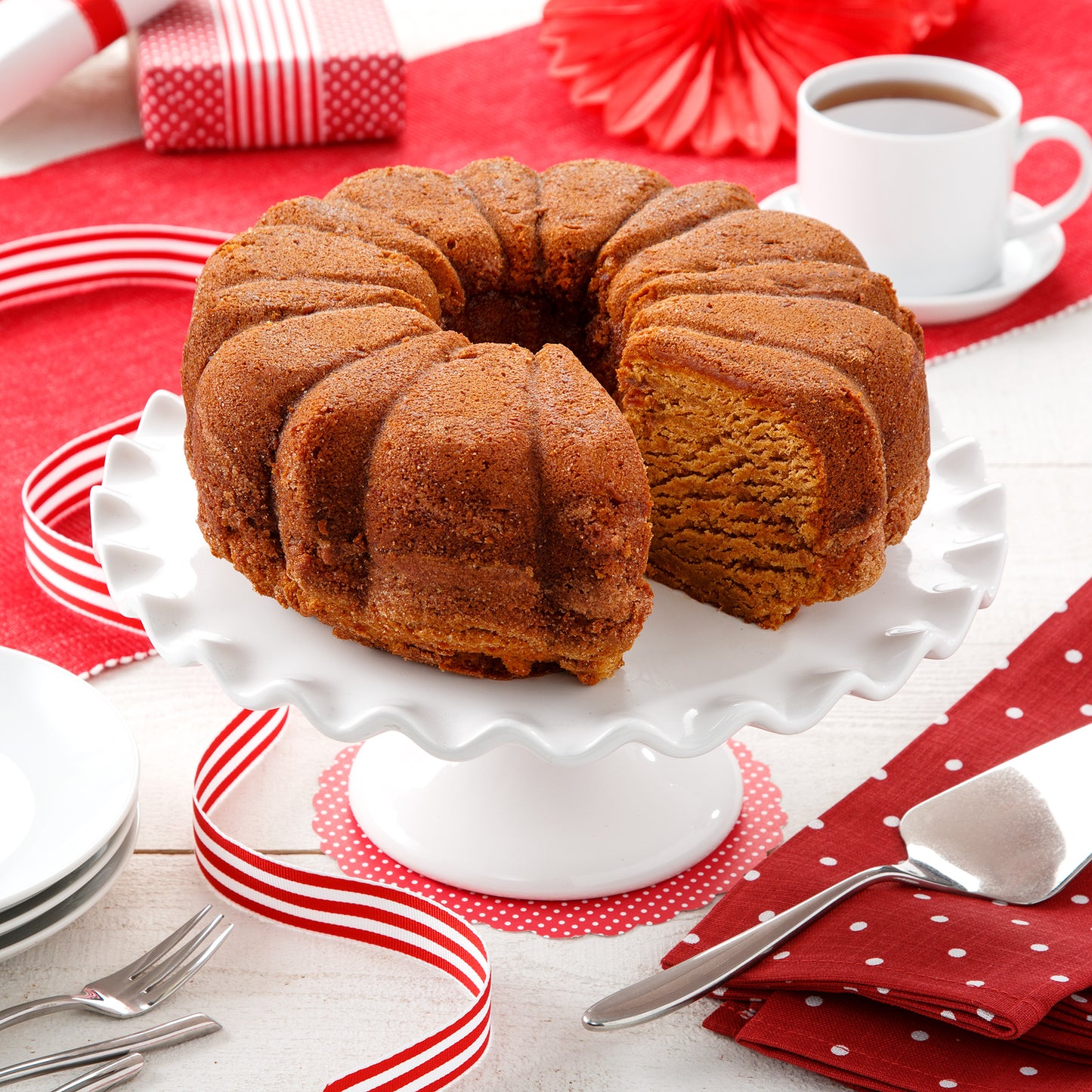 Pumpkin spice coffee cake on a white plate