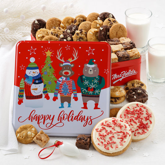 Red festive keepsake tin featuring our favorite friends dressed in their holiday best. Inside are 24 assorted Nibblers® bite-sized cookies, 12 brownie bites and 2 frosted peppermint round cookies. 