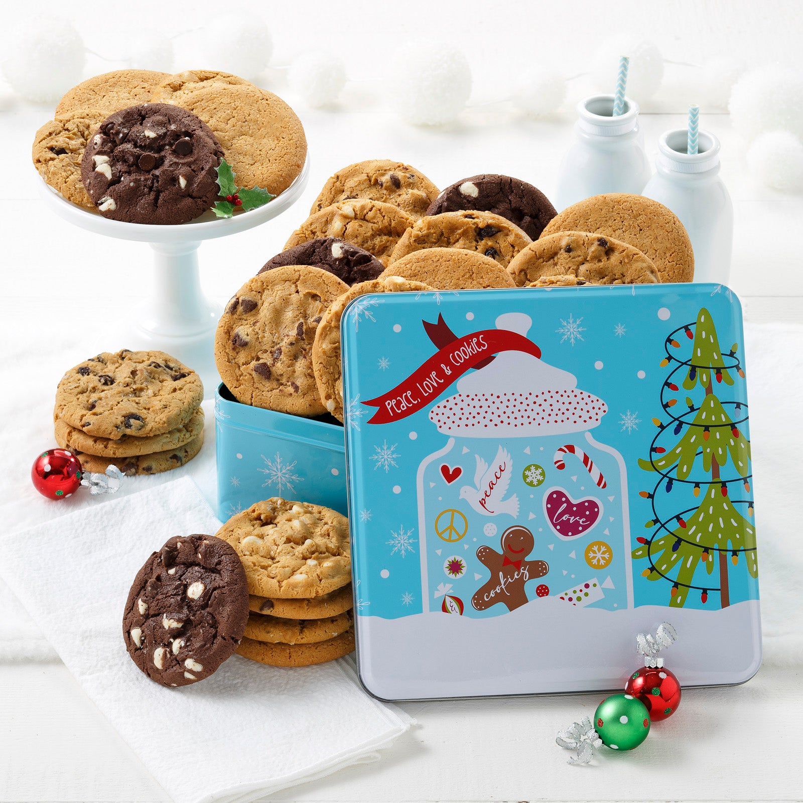 Blue peace love and cookies tin featuring a jar with festive holiday treats. This tin includes 24 original  recipe cookies.