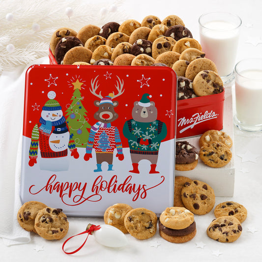 Red tin featuring an imaginative trio of Christmas characters, this cheerful collectible container includes a selection of 48 Nibblers® bite-sized cookies.